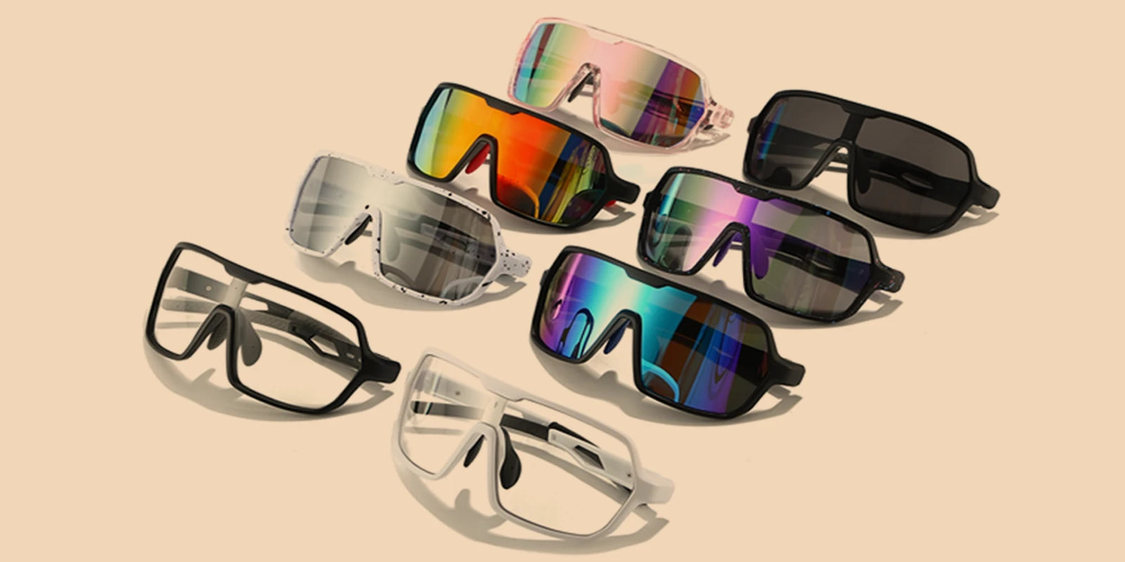 Collection of colorful sunglasses on a beige background
